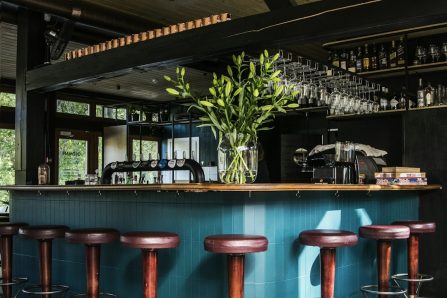empty bar chairs during daytime